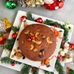 New Year 2026: न्यू ईयर पर बिना ओवन बनाएं मज़ेदार चॉकलेट बिस्कुट केक, फॉलो करें इसे बनाने की आसान रेसिपी